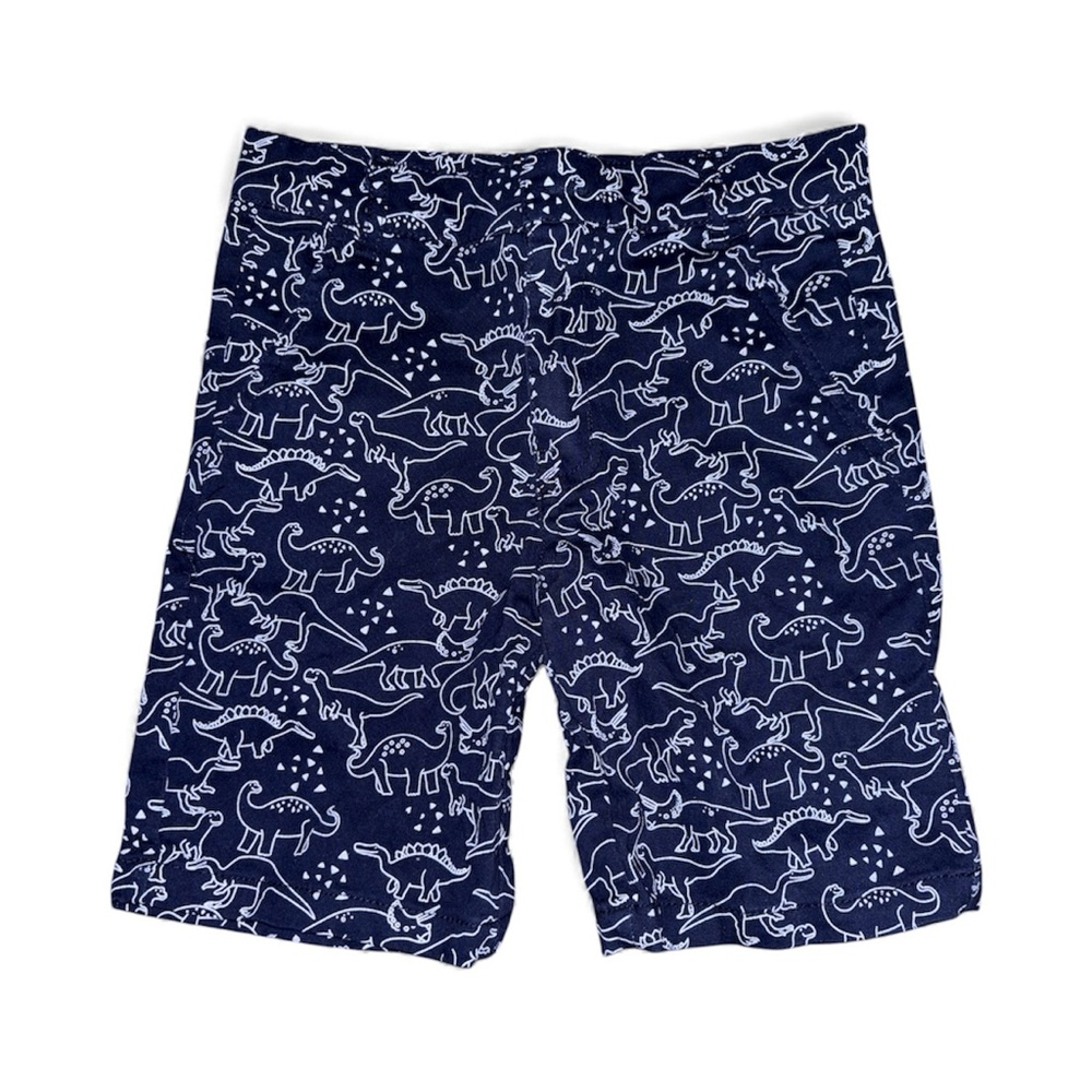 Cute and comfy boys’ shorts featuring a fun white dinosaur print on navy blue.
